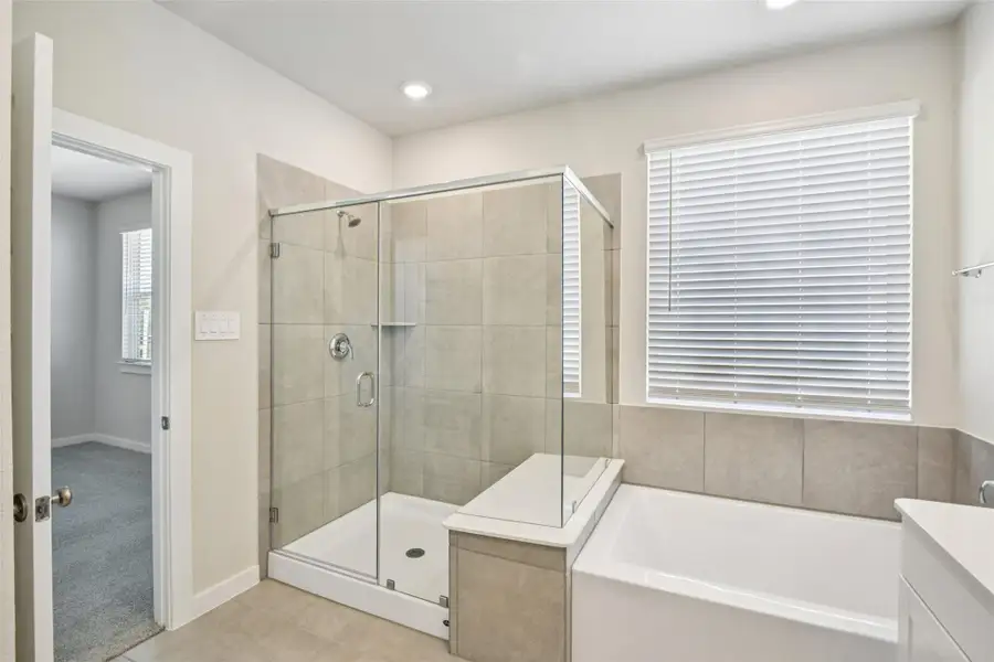 Furnished interior view inside a new home in Spring Brook Village - City Series, Houston (Image 14).