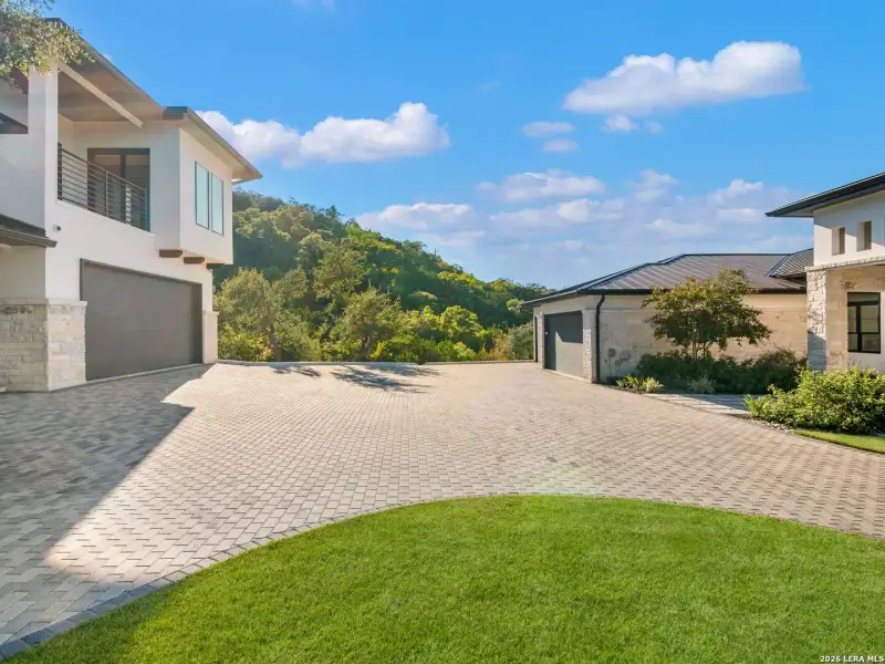 Exterior details and patio area of a home in , San Antonio (Image 33).