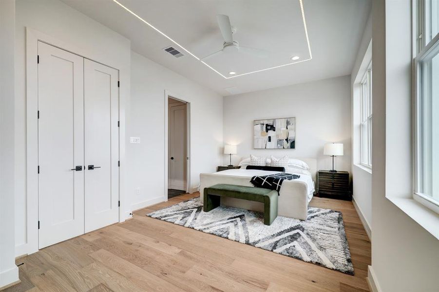 Photos are of 1502 A Ennis, the staged model at Linear on Bell. Choose from two design packages and floor plans. Double door entry, wood floors, and oversized windows.