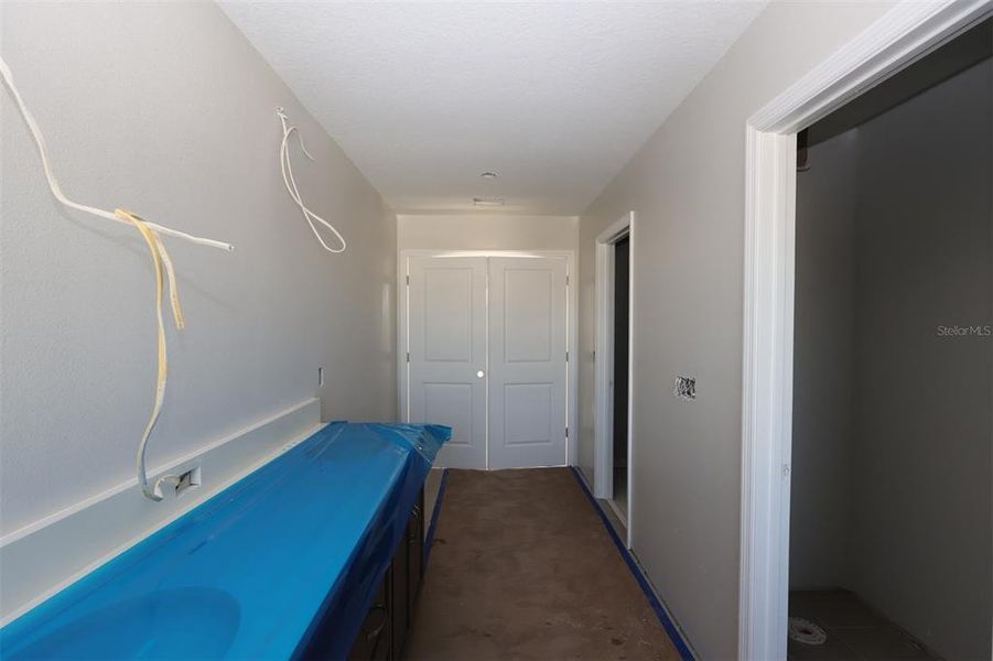 In-progress construction of a new home in Eden at Crossprairie, St. Cloud, FL (Image 8).