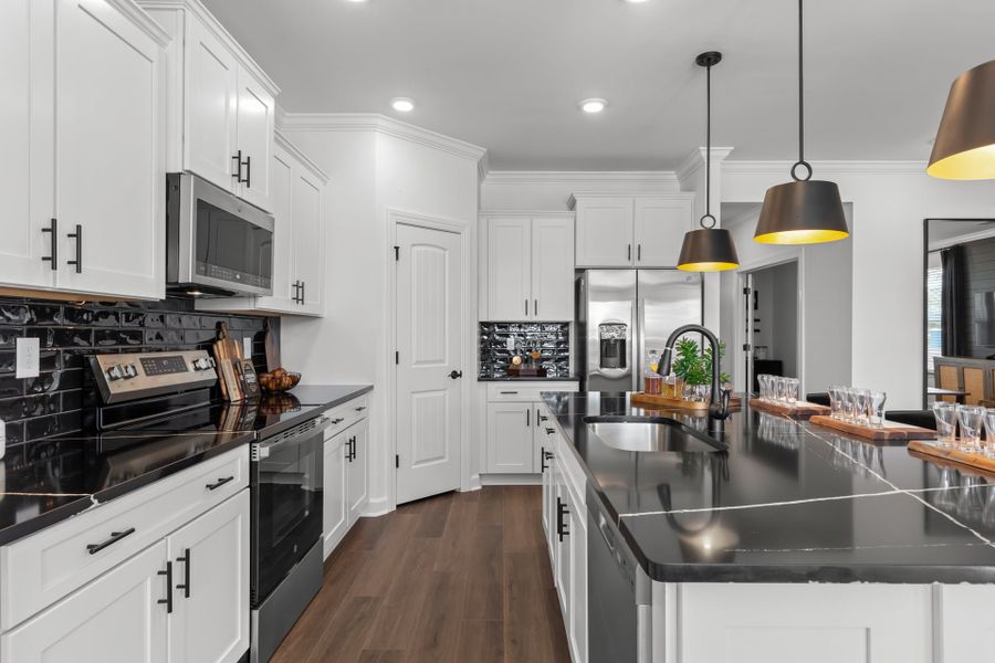 Representative furnished interior of a home built from the The Redbud by Chesapeake Homes in Coastal Club of the Carolinas, Calabash (Image 34).