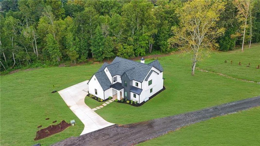 Front exterior of a new home in , Canton, GA, highlighting curb appeal (Image 32).