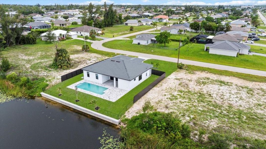 Front exterior of a new home in , Cape Coral, FL, highlighting curb appeal (Image 30). Front exterior of a new home in , Cape Coral, FL, highlighting curb appeal (Image 30).