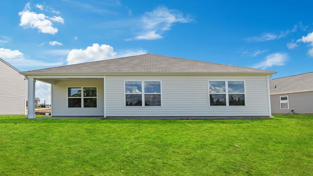 Exterior details and patio area of a home in Lightwood Cottages, Moore (Image 4).