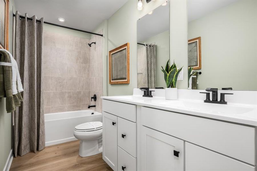 Representative furnished interior of a home built from the Geneva with 3 Car Garage by Ryan Homes in Middle Creek Village, Bolivia (Image 60).