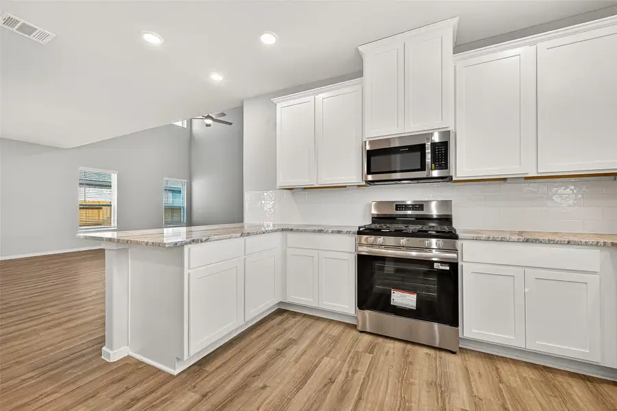 Furnished interior view inside a new home in Sunterra, Katy (Image 11). Furnished interior view inside a new home in Sunterra, Katy (Image 11).