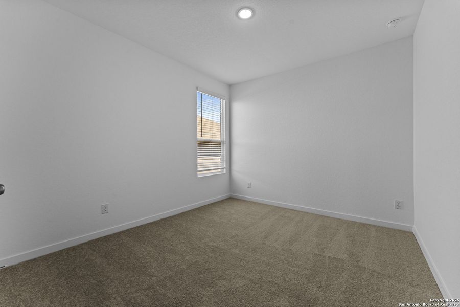 Spacious, unfurnished interior of a new home in Waterwheel: Coastline Collection, San Antonio (Image 13).