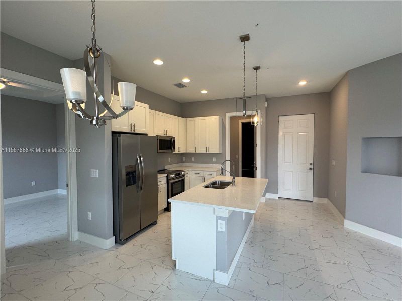 Furnished interior view inside a new home in , Lehigh Acres (Image 6).