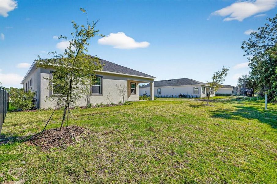 Exterior details and patio area of a home in Gray Hawk at Hole Two, Daytona Beach (Image 32).