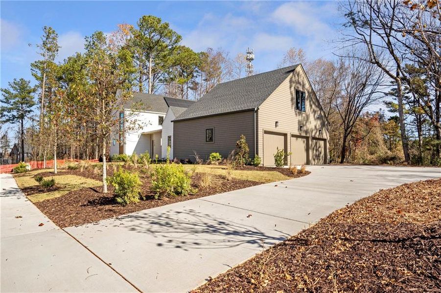 Front exterior of a new home in Aster, Roswell, GA, highlighting curb appeal (Image 26).