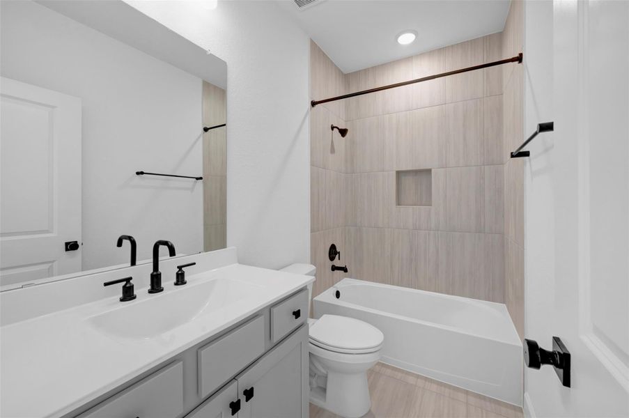 Furnished interior view inside a new home in Prairieland Village - Grove Collection, Cypress (Image 9).