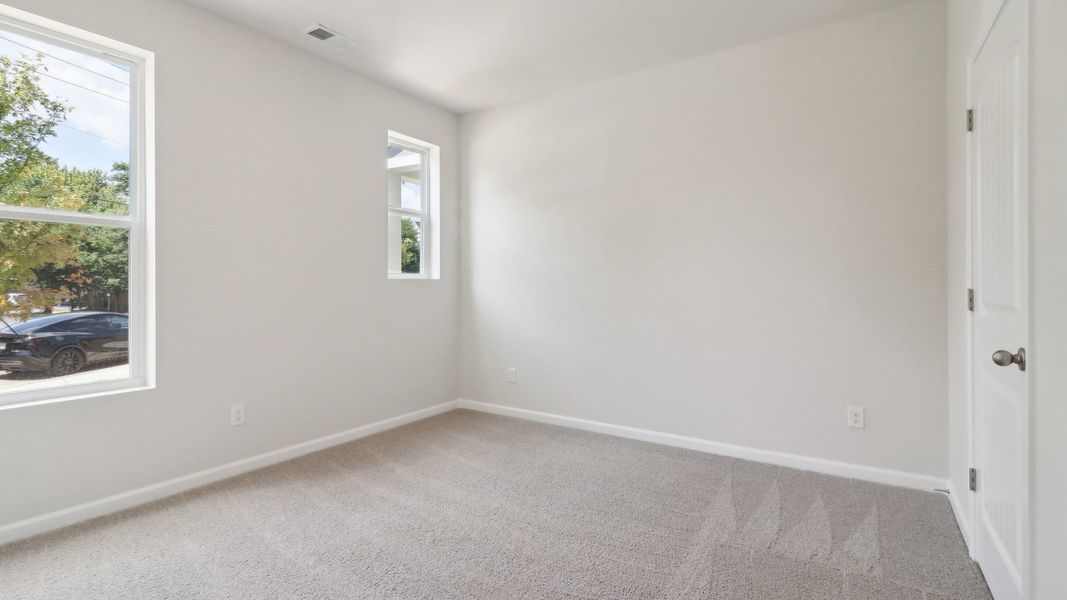 Spacious, unfurnished interior of a new home in Townes at Asbury, Hapeville (Image 18).