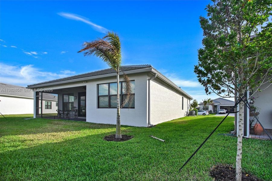 Exterior details and patio area of a home in , Port St. Lucie (Image 18).