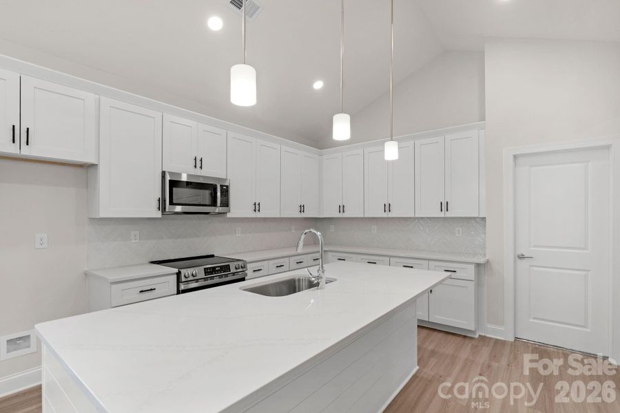 Furnished interior view inside a new home in , Monroe (Image 13).