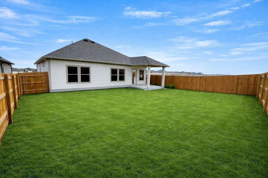 Rear of Home and Private Backyard