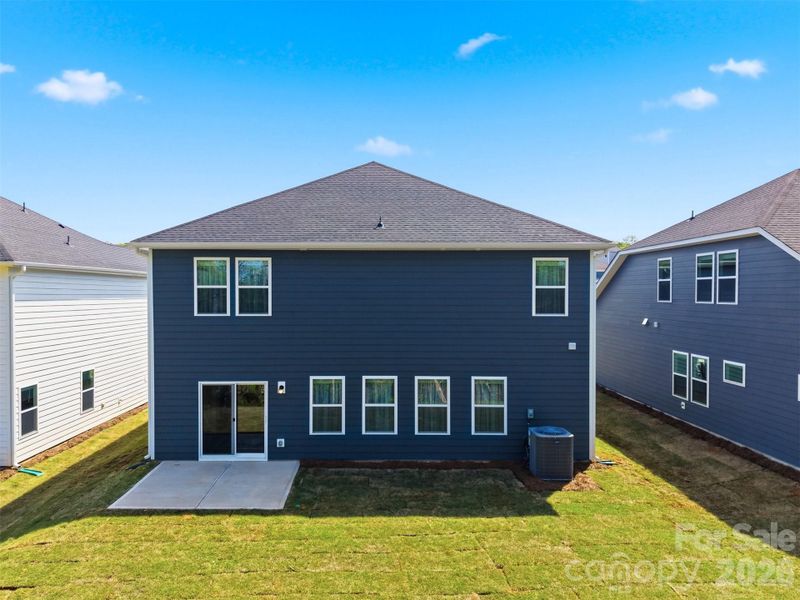 Exterior details and patio area of a home in Buffalo Ridge, Newton (Image 30).