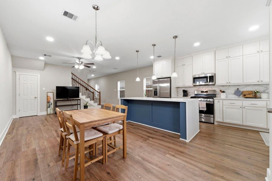 Dining area offers a warm and welcoming setting for family dinners, holidays, and special occasions.