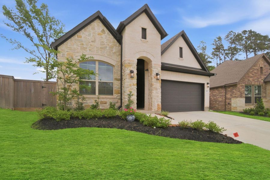 Front exterior of a new home in , Willis, TX, highlighting curb appeal (Image 20).
