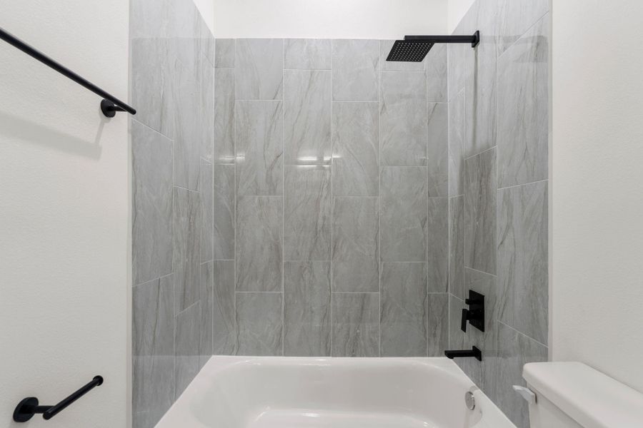 Complete with a shower/tub combo.