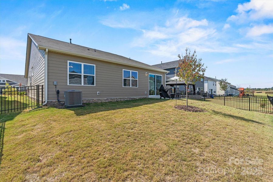 Exterior details and patio area of a home in Waxhaw Landing, Monroe (Image 24).