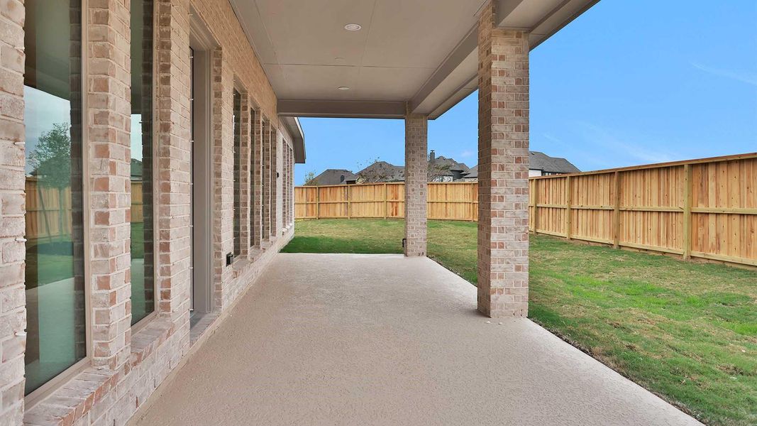 Exterior details and patio area of a home in Meridiana, Manvel (Image 4). Exterior details and patio area of a home in Meridiana, Manvel (Image 4).