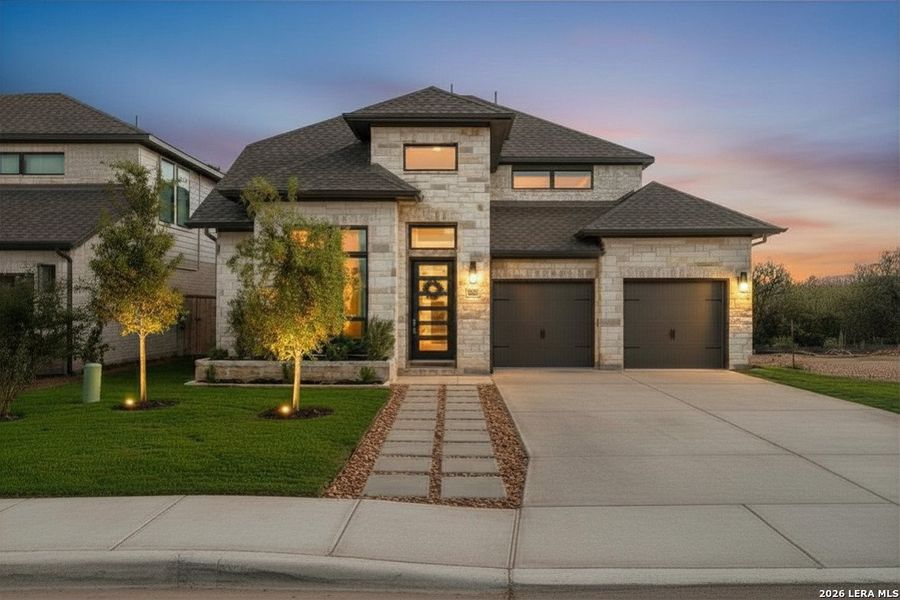 Front exterior of a new home in Ladera, San Antonio, TX, highlighting curb appeal (Image 1). Front exterior of a new home in Ladera, San Antonio, TX, highlighting curb appeal (Image 1).