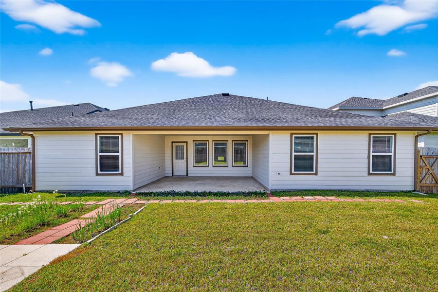 Exterior details and patio area of a home in Windstone on the Prairie, Richmond (Image 17).