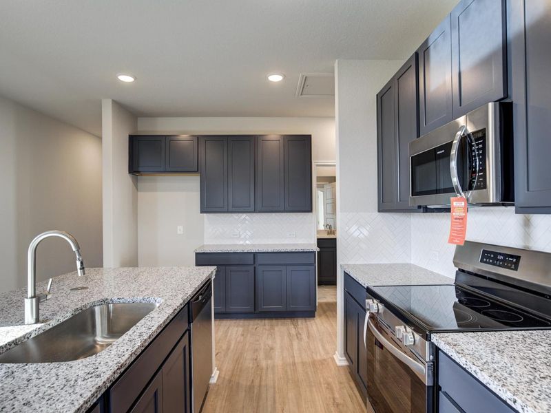Representative furnished interior of a home built from the The Frio A by Davidson Homes LLC in Agave, San Antonio (Image 8). Representative furnished interior of a home built from the The Frio A by Davidson Homes LLC in Agave, San Antonio (Image 8).