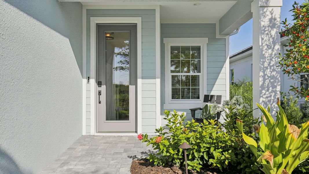 Exterior details and patio area of a home in Boca Royale Golf & Country Club Real Estate and Homes for Sale in Englewood, FL - Neal Communities, Englewood (Image 3). Exterior details and patio area of a home in Boca Royale Golf & Country Club Real Estate and Homes for Sale in Englewood, FL - Neal Communities, Englewood (Image 3).