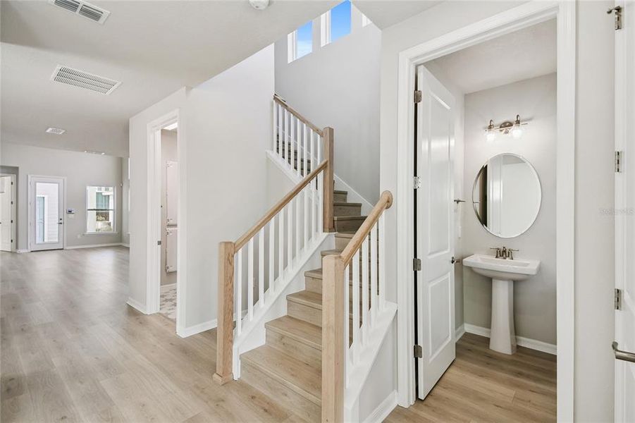 Furnished interior view inside a new home in Weslyn Park in Sunbridge 34', St. Cloud (Image 12).