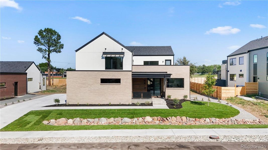 Front exterior of a new home in , Golden, CO, highlighting curb appeal (Image 1).