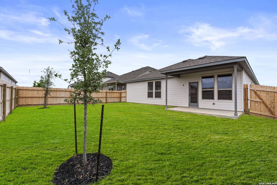 Exterior details and patio area of a home in Dove Song, Marion (Image 21).