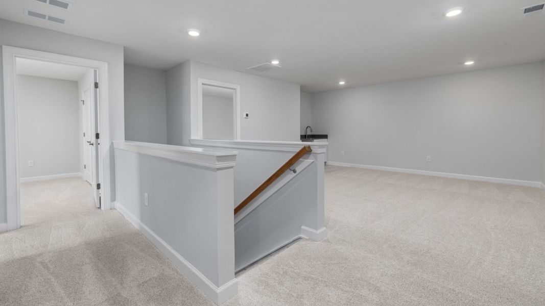 Spacious, unfurnished interior of a new home in The Courtyards at Oak Grove, Durham (Image 23).