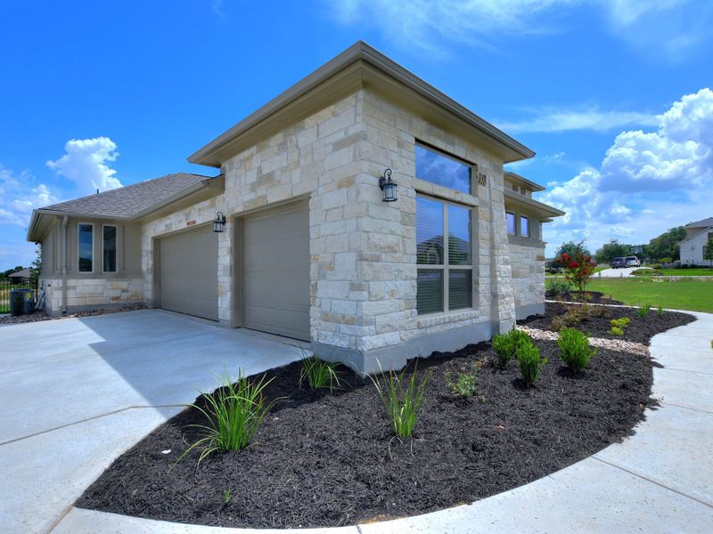 Representative exterior photo of a completed home built from the San Simeon I by Giddens Homes in Clearwater Ranch, Liberty Hill, TX (Image 55).