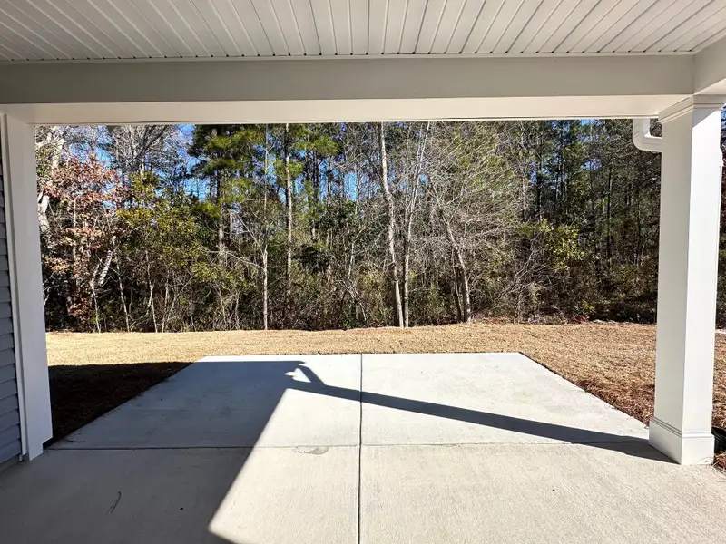 Exterior details and patio area of a home in Patriot’s Watch, Hampstead (Image 2). Exterior details and patio area of a home in Patriot’s Watch, Hampstead (Image 2).