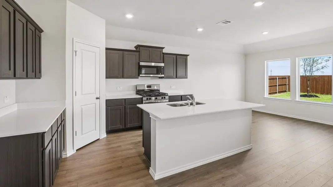 Furnished interior view inside a new home in Windrose, Pilot Point (Image 3).