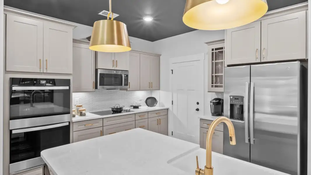 Furnished interior view inside a new home in Village at Midway, Anderson (Image 10).