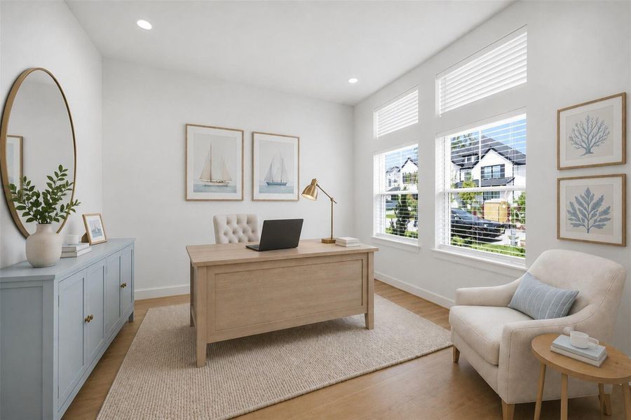 **Virtually Staged** Dedicated home office with large windows and flexible functionality—perfect for remote work or creative space.