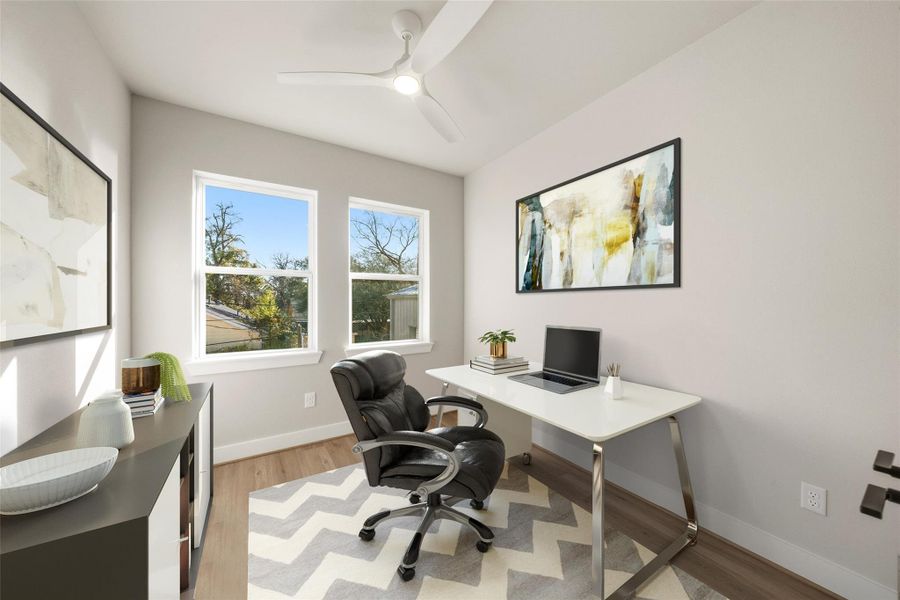 Virtually staged secondary bedroom as a study.