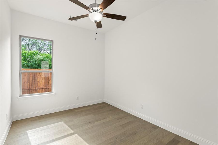 Spacious, unfurnished interior of a new home in Villas at Long Branch, Rowlett (Image 26).