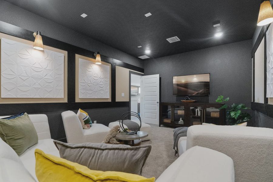 Representative furnished interior of a home built from the Madison by Chesmar Homes in Lakes of Cane Island, Katy (Image 15).
