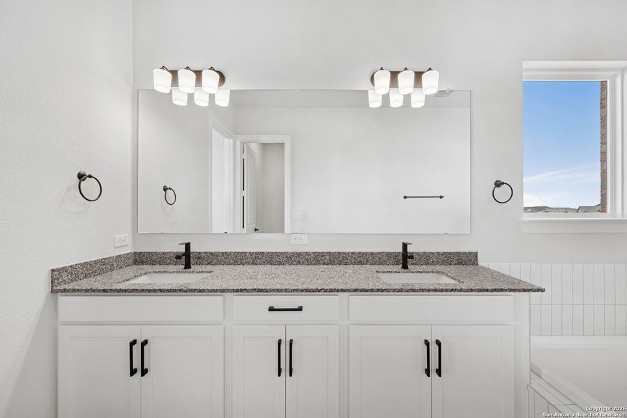 Furnished interior view inside a new home in Windsong - Legacy Series, Boerne (Image 11).