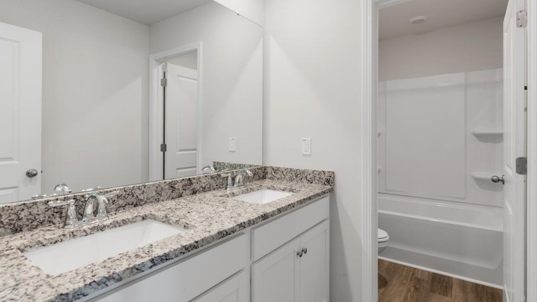 Furnished interior view inside a new home in The Haven at Indigo Preserve, Leland (Image 14).