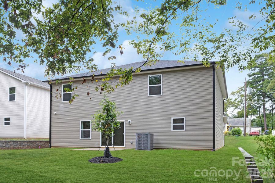 Exterior details and patio area of a home in , Huntersville (Image 3).