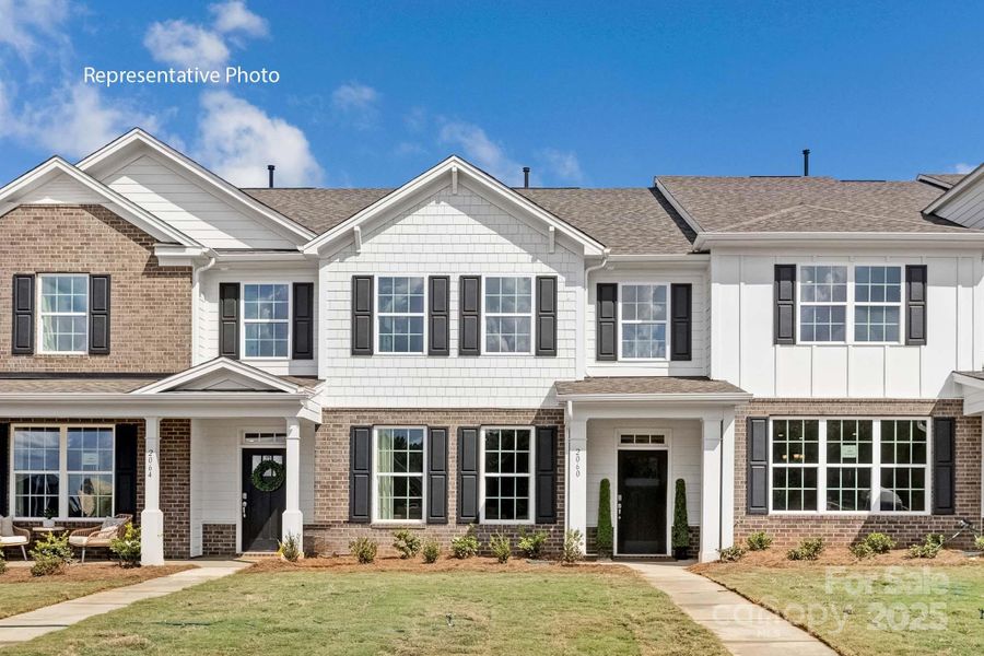 Front exterior of a new home in Sanctuary at Southgate, Indian Trail, NC, highlighting curb appeal (Image 1).