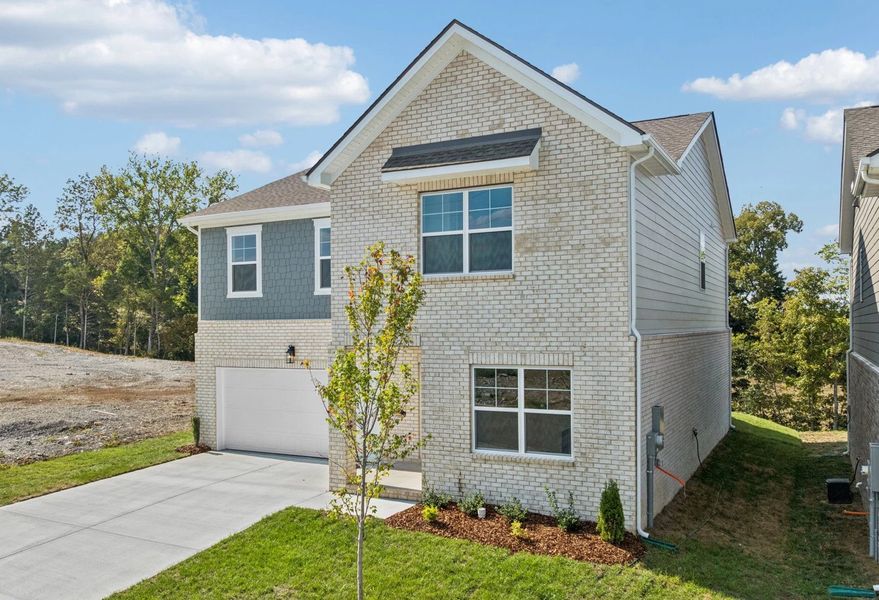 Front exterior of a new home in Cades Bluff, Lebanon, TN, highlighting curb appeal (Image 20).