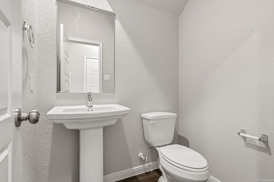 Furnished interior view inside a new home in Hickory Ridge, Elmendorf (Image 13).