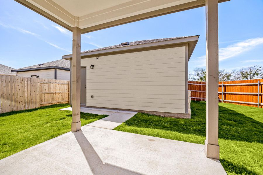 Exterior details and patio area of a home in , Round Rock (Image 25).