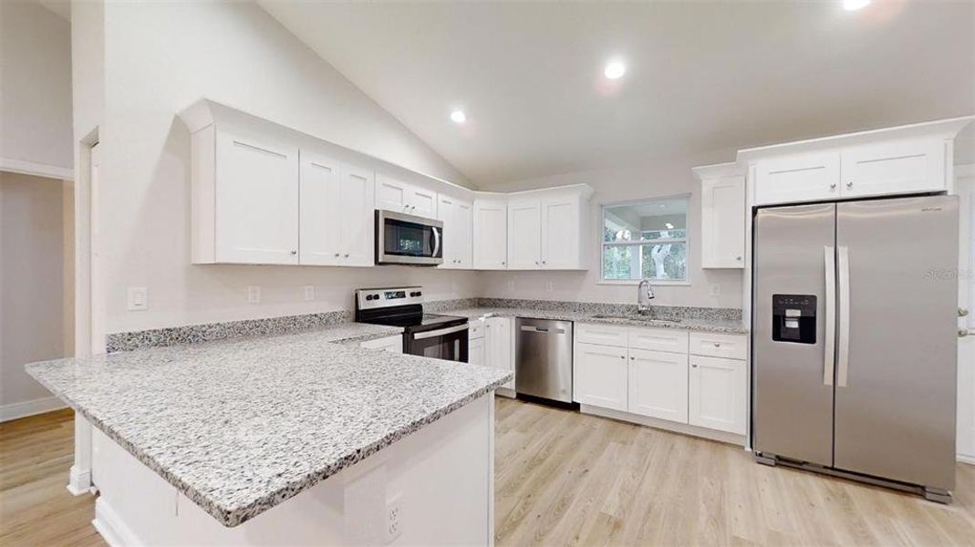 Furnished interior view inside a new home in , Dunnellon (Image 6).