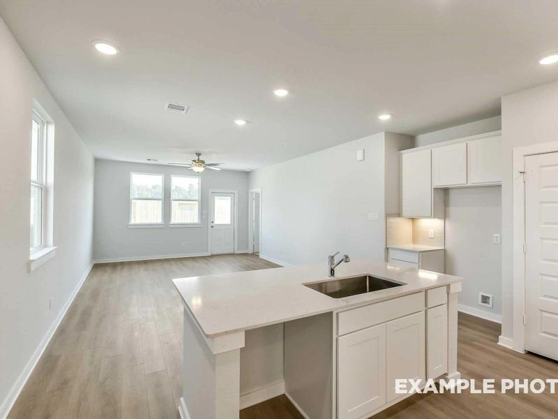 Furnished interior view inside a new home in Caney Creek Place, Conroe (Image 8).